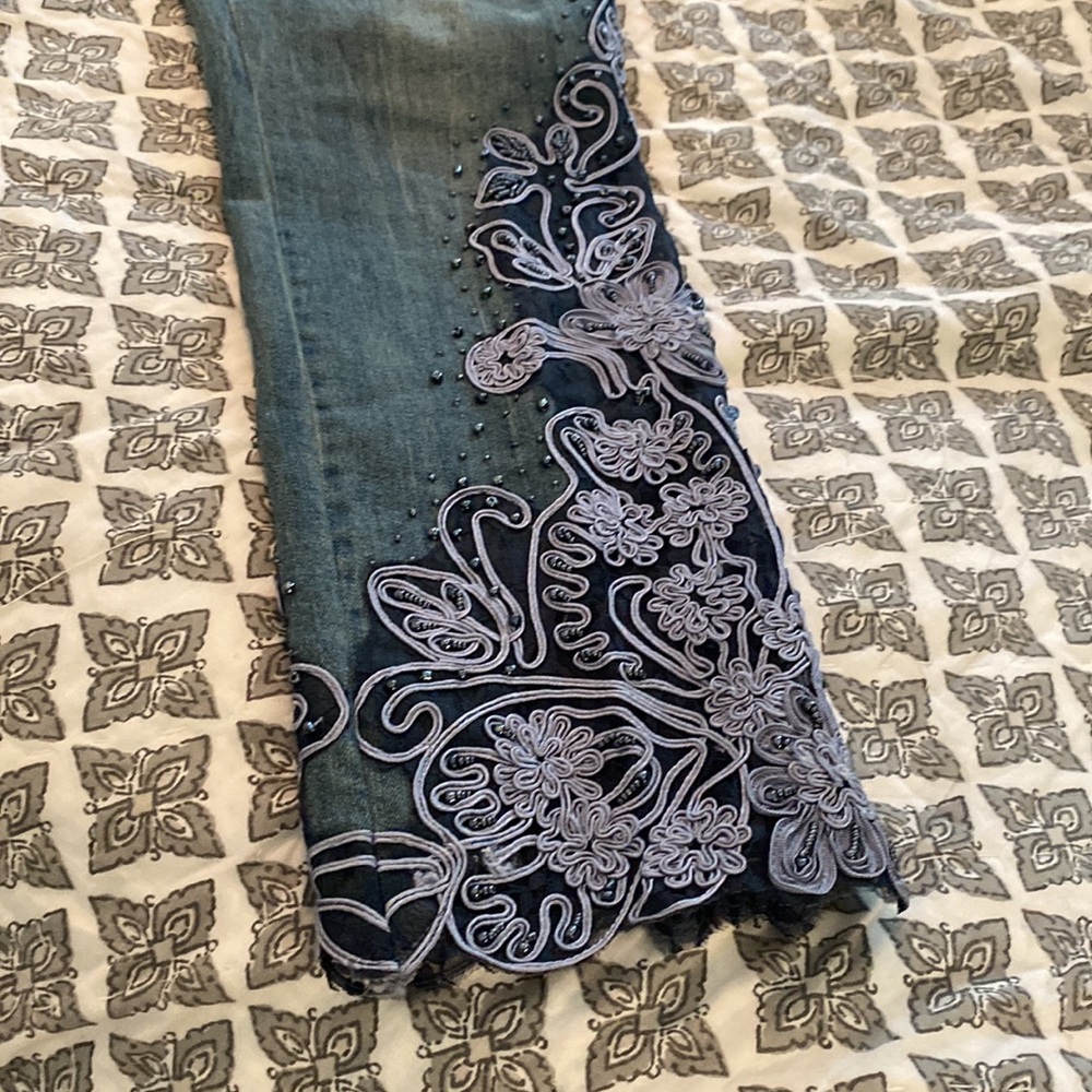 Soft Surroundings jeans with lace detail on legs.